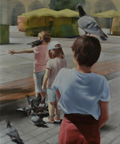 boys playing with pigeons on a summer holiday trip